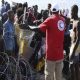 Les migrants bloqués sont confrontés à la violence et au désespoir alors que la Tunisie s'associe pour les éloigner de l'Europe